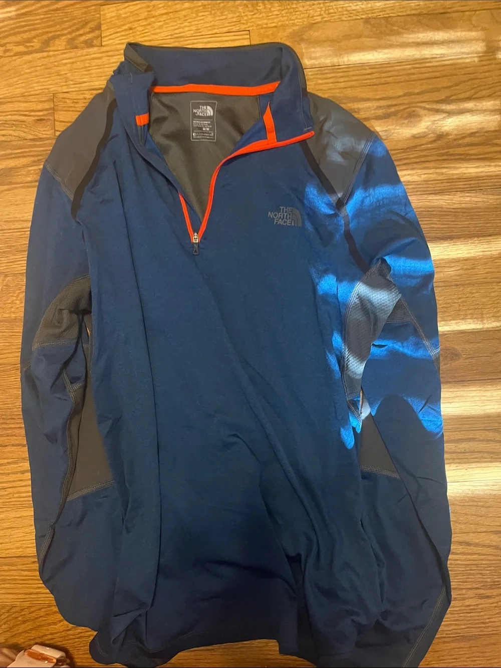 The North Face Men's Navy Half-Zip Pullover with Orange Trim